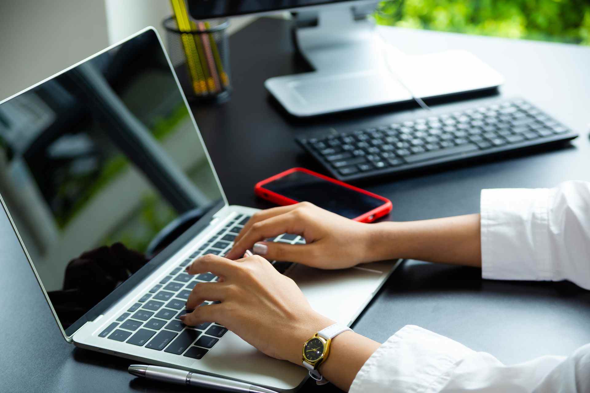 female-hand-typing-keyboard-laptop-2